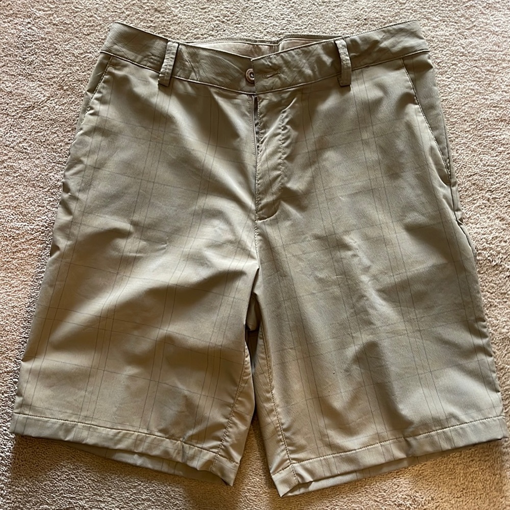 Under Armour golf shorts with a pint stripe